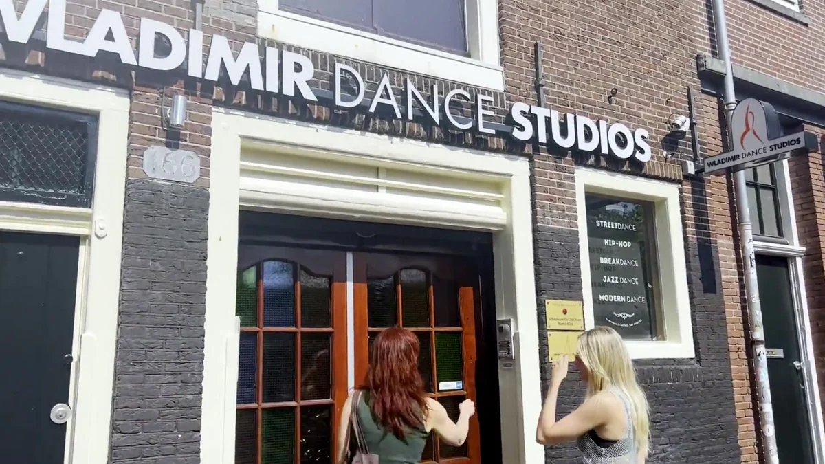 A guest arriving at a dance studio during a previous Teleport private experience